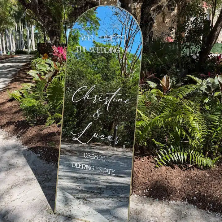 Be Extra Miami wedding rental inspiration in Miami — Welcome mirror with bride and groom — Miami wedding event rental.